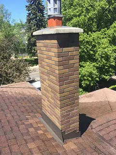 Chimney rebuild with new flashings, after