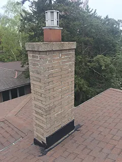 Chimney rebuild with new flashings, before