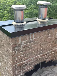 Steel chimney cap